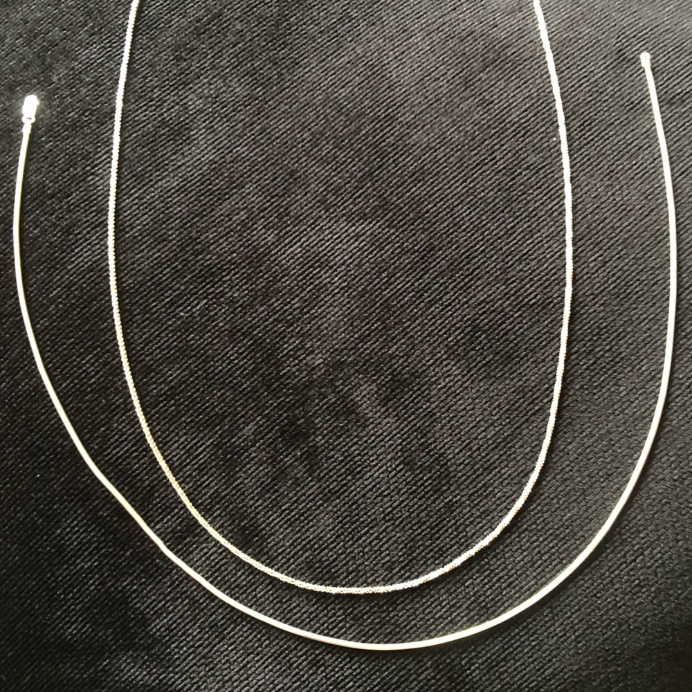 2 Beautiful Sterling Silver Chain necklaces (see pics)